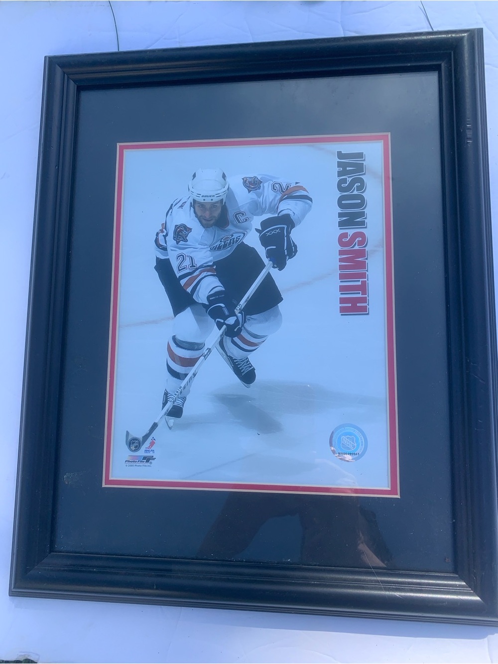 Framed Jason Smith Edmonton Oilers action photo.
